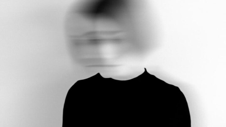 woman wearing long sleeved shirt